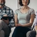 Group meeting with counselor for people trying to gain life balance
