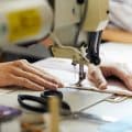 Woman sewing on sewing machine