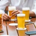 Glasses of ice cold beer on a pub table