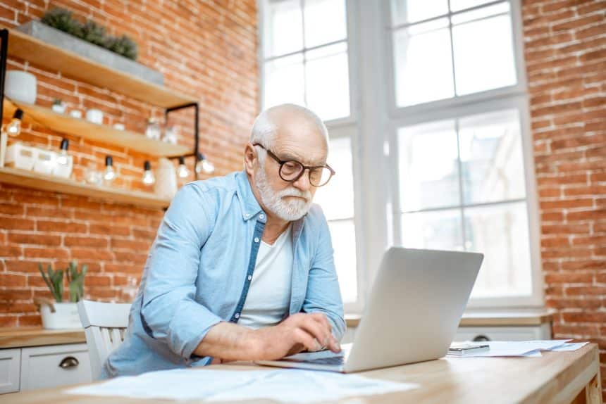 Senior man with laptop