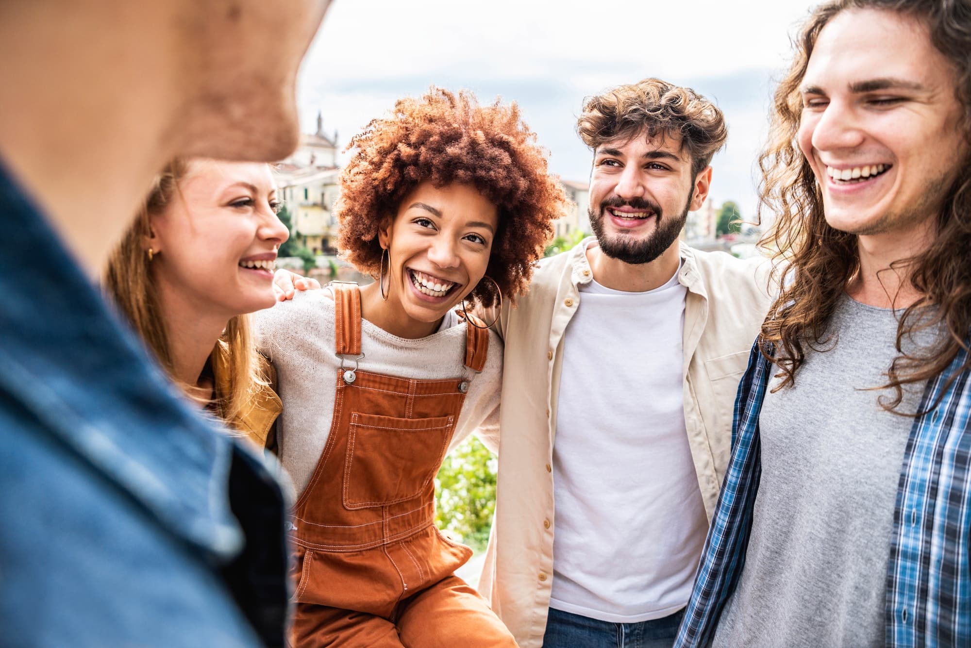 Young happy people laughing together
