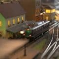Scale model railway layout with steam locomotives.