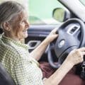 Senior woman driving car