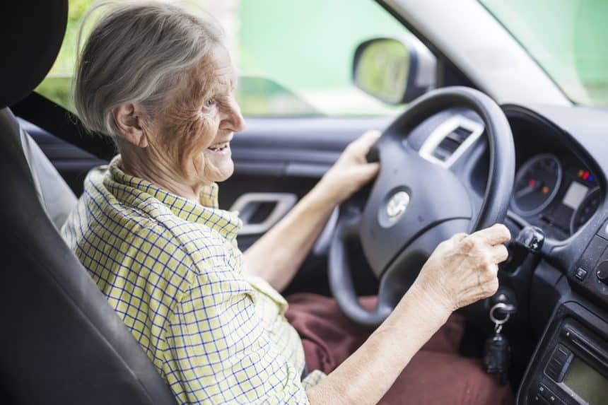 Senior woman driving car