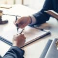 Businessman and lawyer discuss the contract document. Treaty of the law. Sign a contract business.
