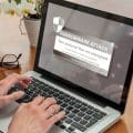 Ransom ware, Cyber attack. Warning message on a computer screen. Woman work with a laptop.