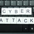 white square with cyber attack alphabet letters. cyber attack concept