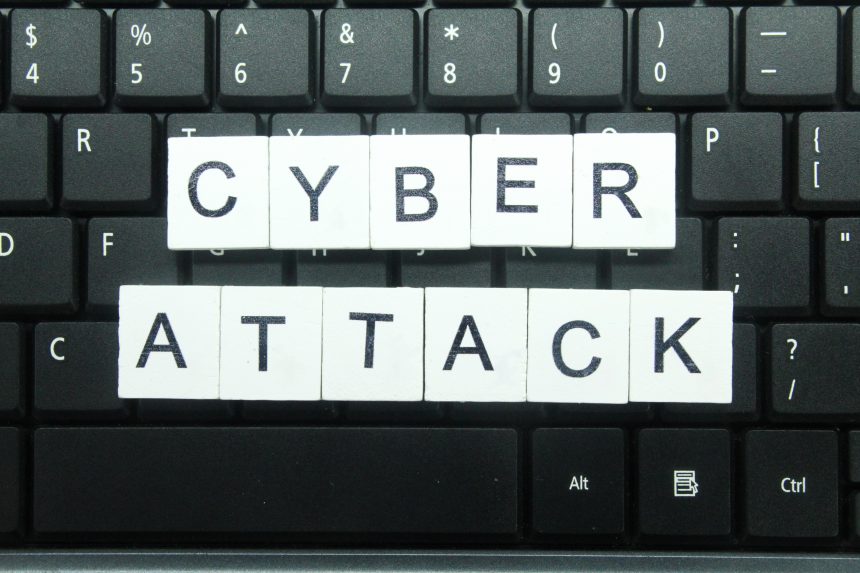 white square with cyber attack alphabet letters. cyber attack concept
