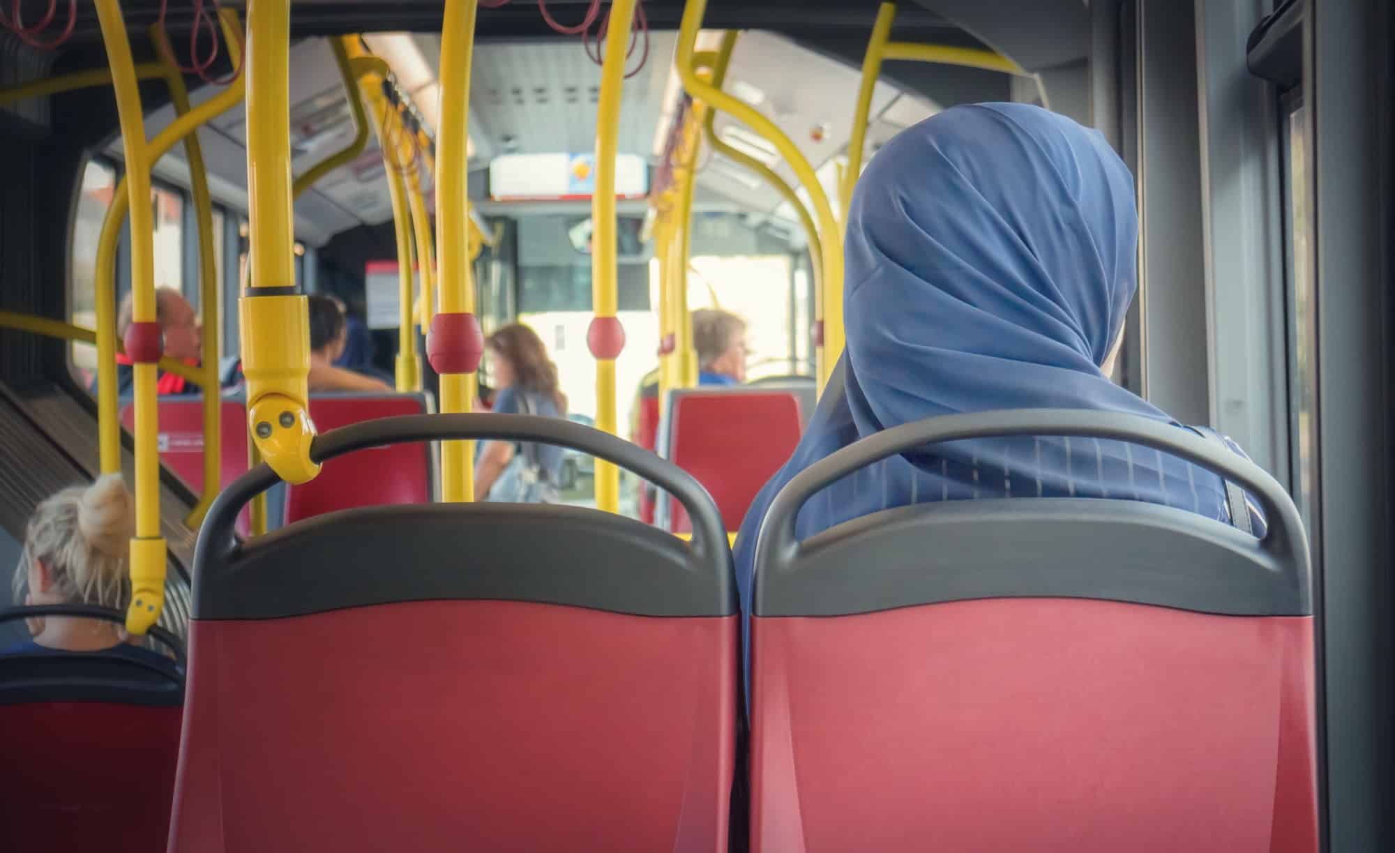 Muslim women in scarf in a Bus