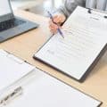 Business woman giving information on contract